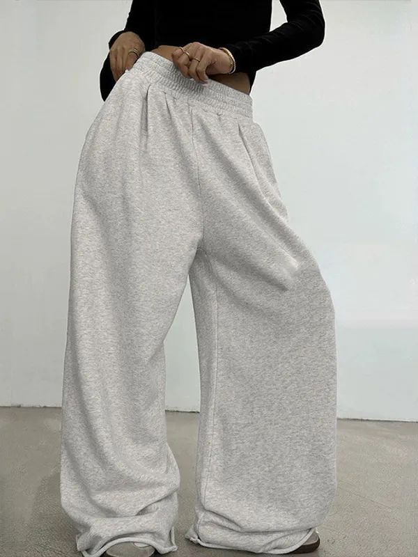 Pantalones deportivos con detalle de solapa unicolor